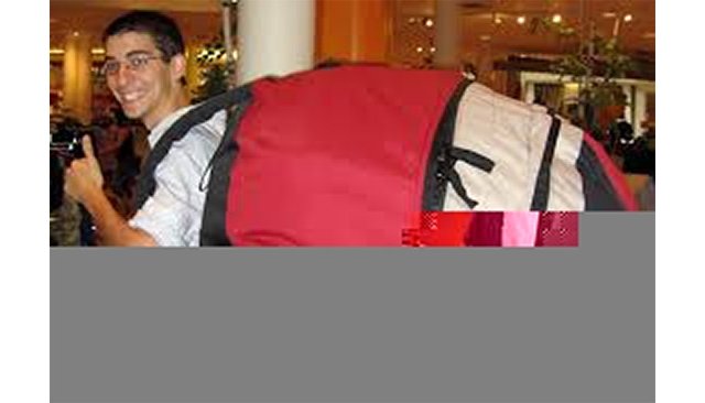 a less corrupted picture of a person wearing an oversized backpack