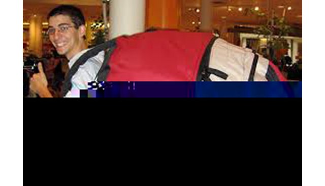 a corrupted picture of a person wearing an oversized backpack